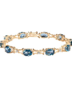 Bransoleta złota z topazami London Blue i diamentami